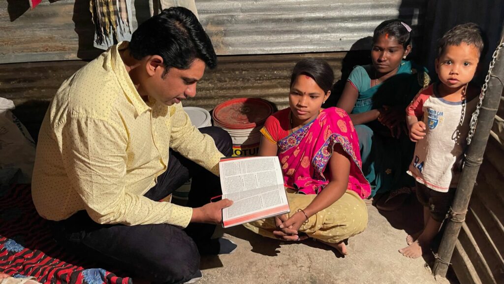 image of pastor sharing the Bible